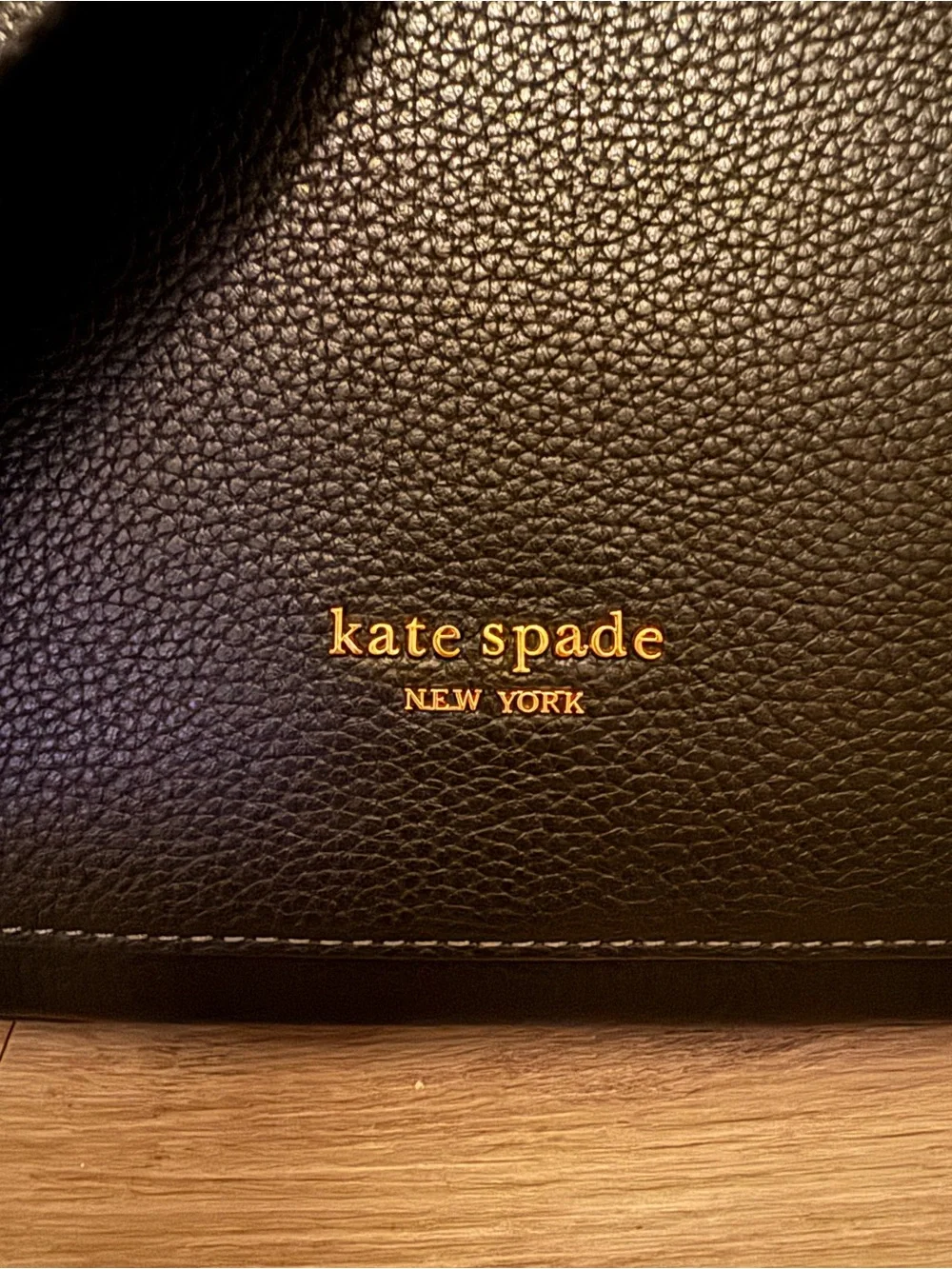 kate spade Black Pebbled Leather Curved Crossbody with Gold Hardware